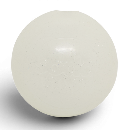 SodaPup Glitter Ball in glow in the dark, off-white in daylight, front view