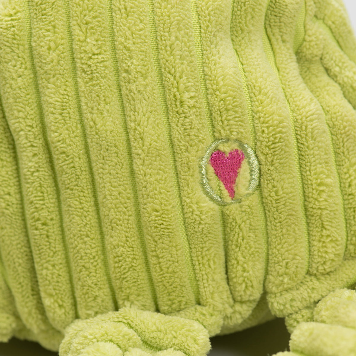 Octavie Octopus Knottie close-up of the embroidered pink heart logo on the lime green Large