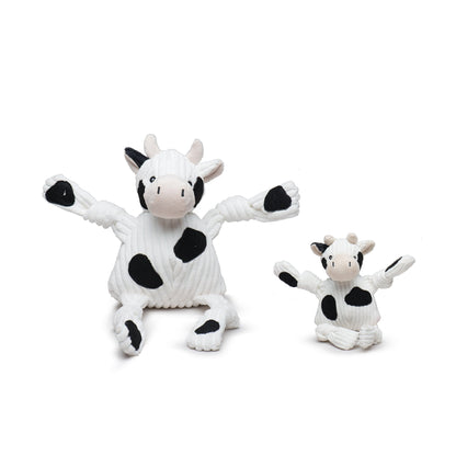 Dottie Cow Knottie dog toy in two sizes side by side on white, arms out