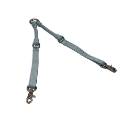 CRAZYcoupl'r Two-Dog Leash Coupler in silver laid out in a V, top view on a white background