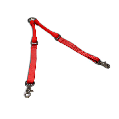 CRAZYcoupl'r Two-Dog Leash Coupler in red laid out in a V, top view on a white background