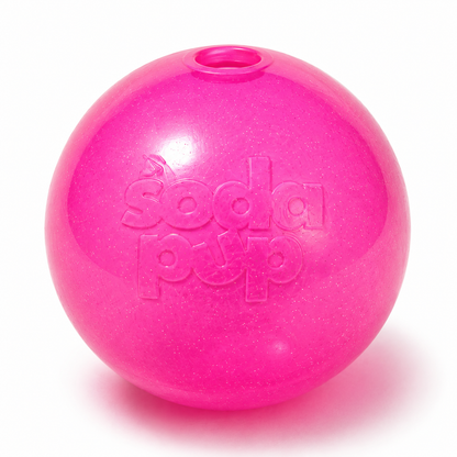 SodaPup Glitter Ball in pink, front view with the treat hole at the top