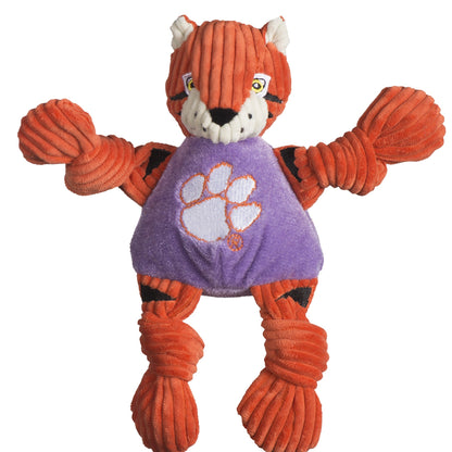 HuggleHounds Clemson Tiger Knottie plush dog toy on white, orange corduroy tiger with a purple shirt and white paw print