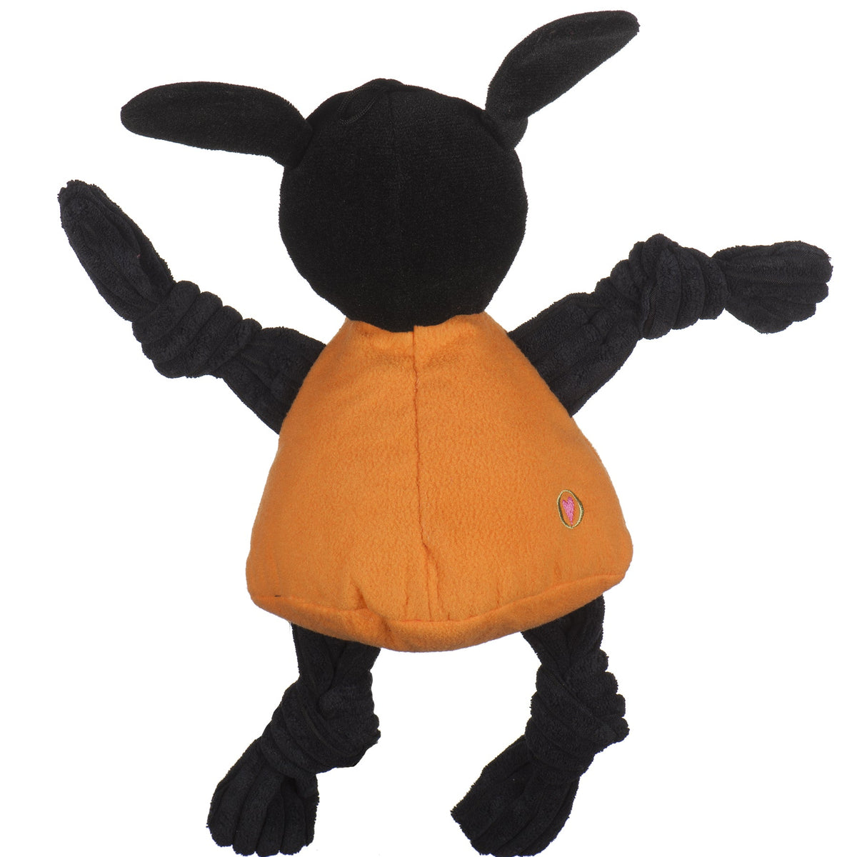 Smokey Knottie dog toy from the back, black corduroy head and ears over the orange shirt