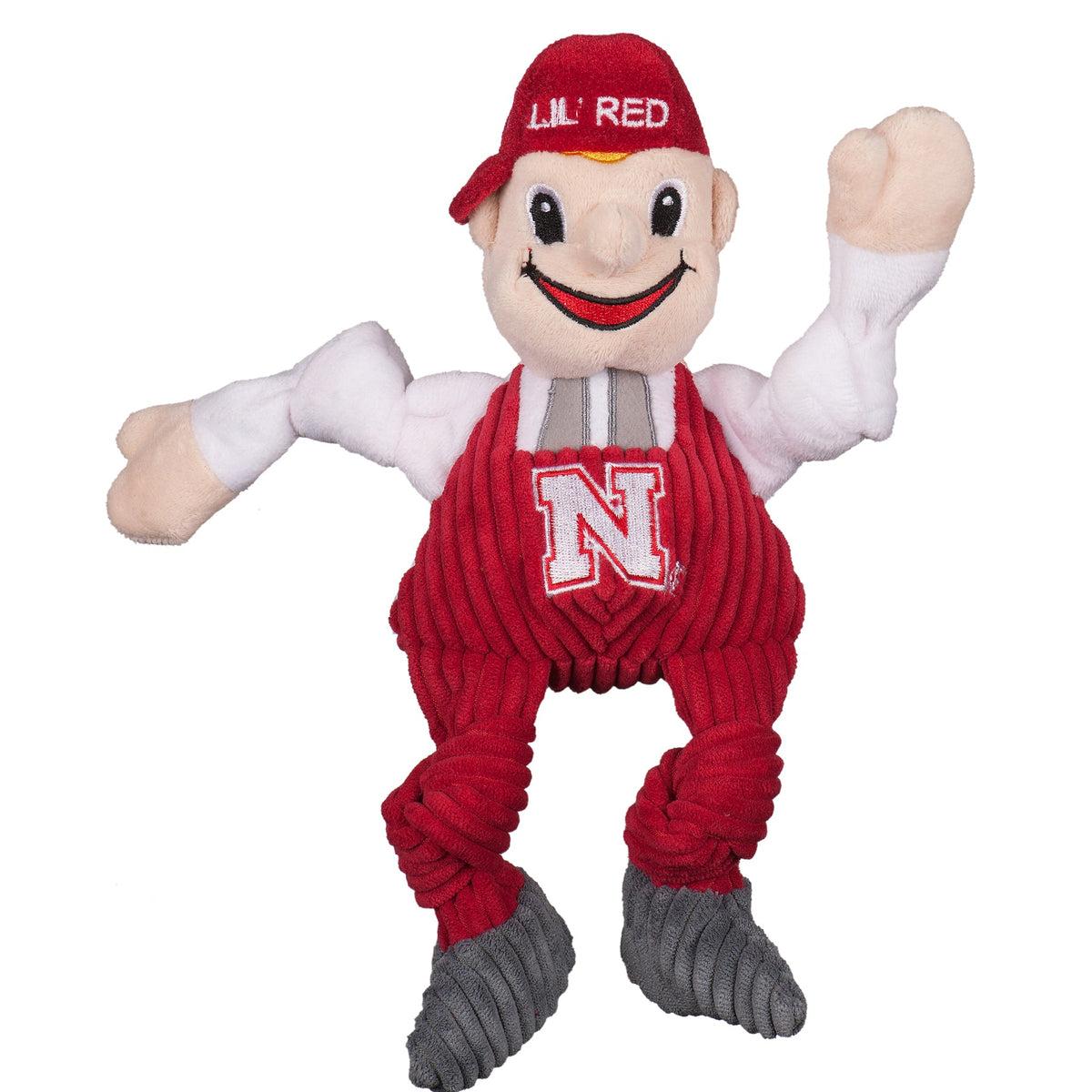 HuggleHounds Nebraska Lil Red Knottie plush dog toy on white, red corduroy overalls with a white N and a LIL' RED cap
