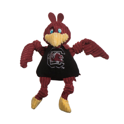 Cocky Knottie dog toy, front view with blue eyes, knotted garnet wings and the Gamecocks logo on a black shirt