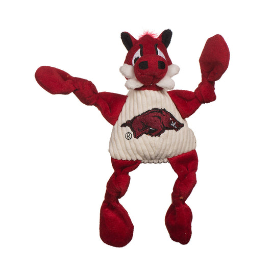 HuggleHounds Arkansas Tusk the Razorback Knottie plush dog toy on white, red hog with white tusks and a cream shirt