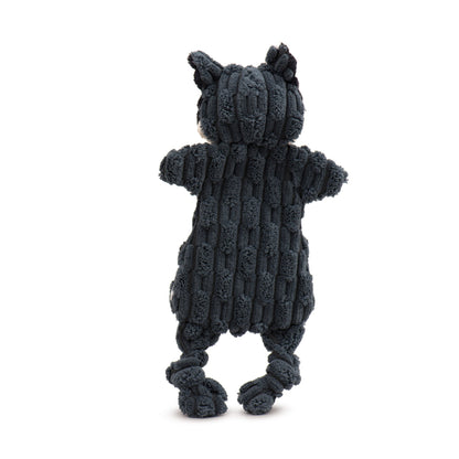 Back view of the gray raccoon Flattie dog toy, showing its flat ribbed corduroy body and two knotted legs