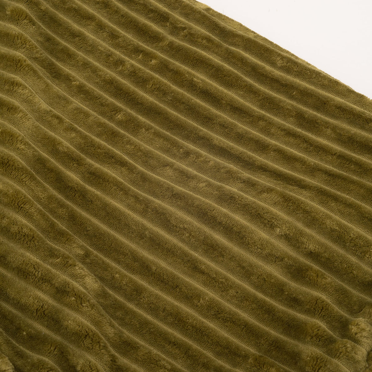 Close-up of the olive Scout Blankie's wide ribbed corduroy plush