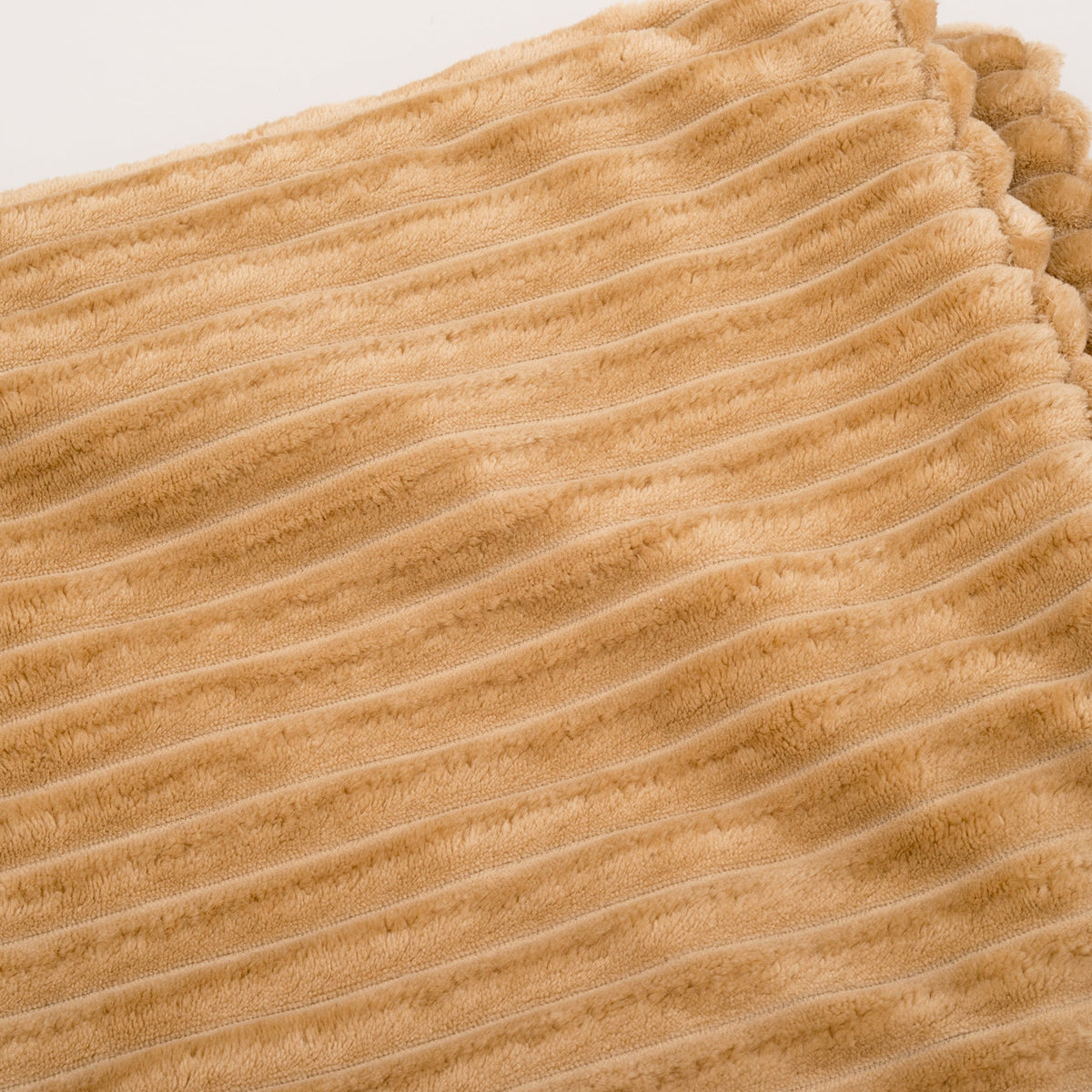 Close-up of the khaki Scout Blankie's extra-wide-wale corduroy plush texture