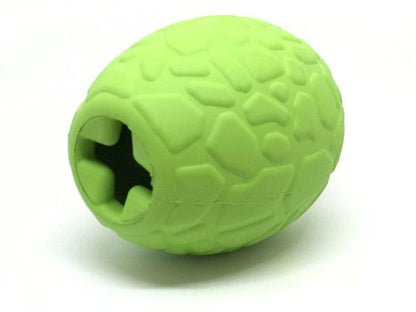 Dinosaur Egg treat dispenser on its side, showing the cross-cut fill opening with rubber teeth at the wide end