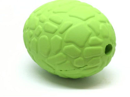 Dinosaur Egg treat dispenser seen from the narrow end, with the small air hole