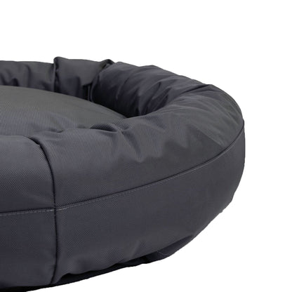 Round Bolstered Armor dog bed in charcoal, close-up of the stuffed rim and its stitched seam