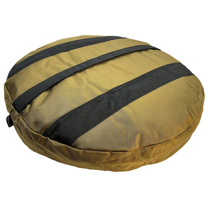 Underside of the camel Round Armor dog bed with two black non-skid strips