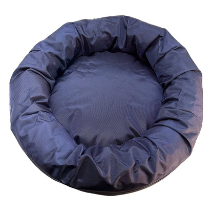 Round Bolstered Armor dog bed in midnight navy, top view looking into the round center cushion