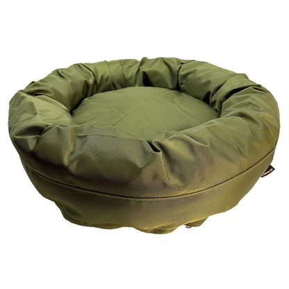 Round Bolstered Armor dog bed in olive green, side view of the deep gathered rim