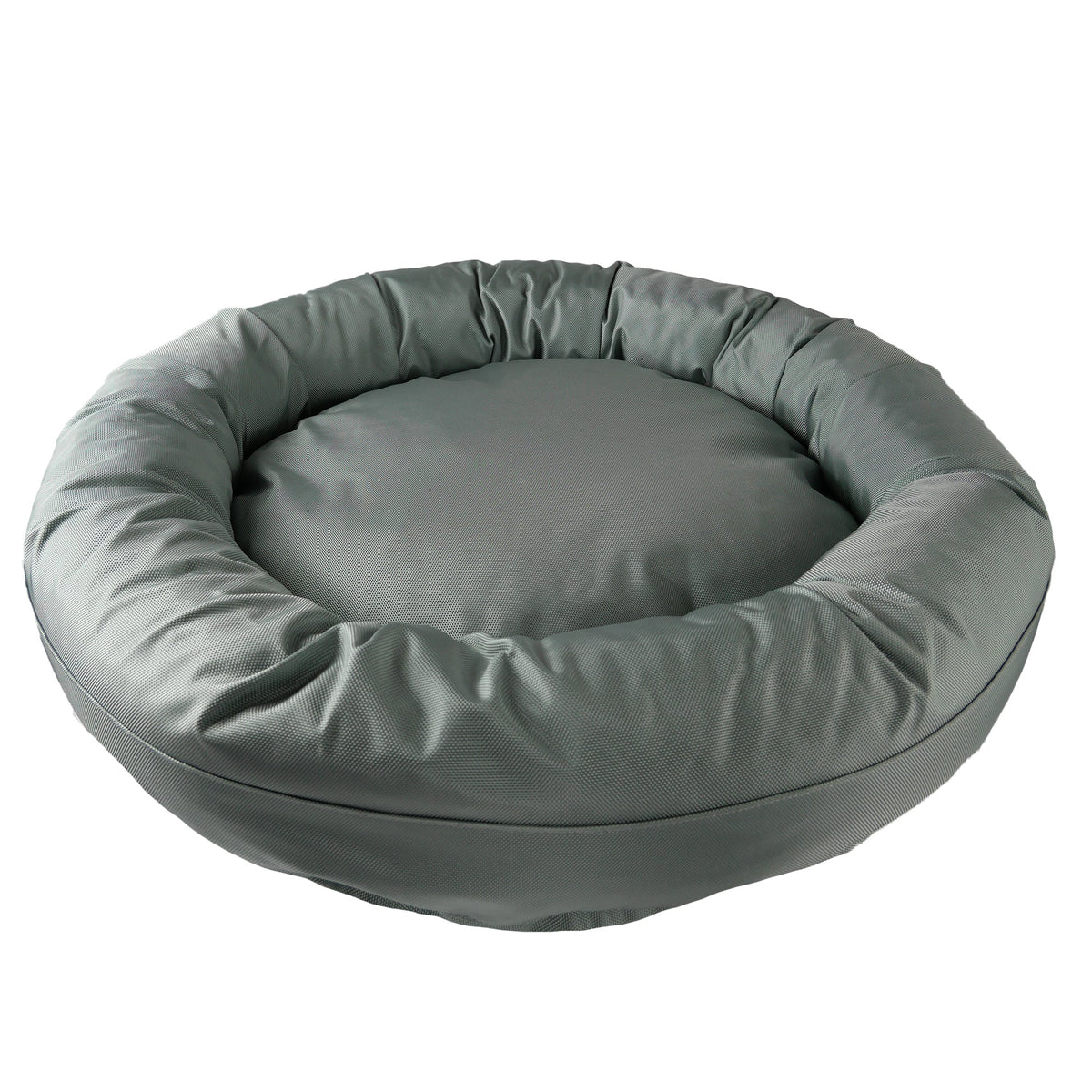 Round Bolstered Armor dog bed in silver gray, angled view of the rim and center cushion