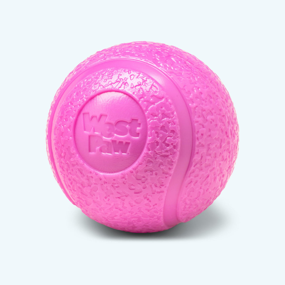 Boundr squishy ball, Large in hot pink, close view of the textured skin and West Paw logo