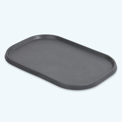 Non-Slip Placemat in sea fog gray, angled view of the low raised rim