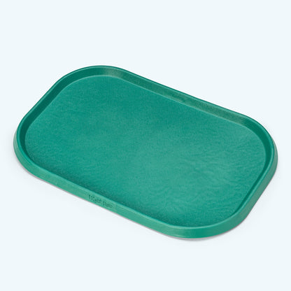 Non-Slip Placemat in kelp green, angled view showing the flat center and rounded corners