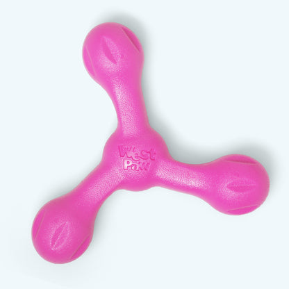 Skamp fetch toy in hot pink, top view of the three grooved arms