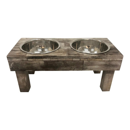 Huntley Pet Berjen raised dog feeder in brown wash reclaimed wood with two stainless steel bowls, three-quarter view