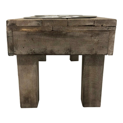 End view of the brown wash Berjen raised dog feeder showing its square wooden legs and plank top