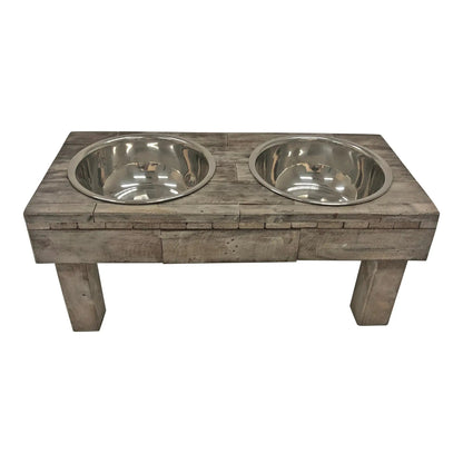 Brown wash raised dog feeder from slightly above the front, showing the weathered plank tabletop