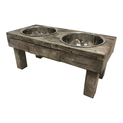 Brown wash wooden raised dog feeder from the right corner, showing the legs and both bowls
