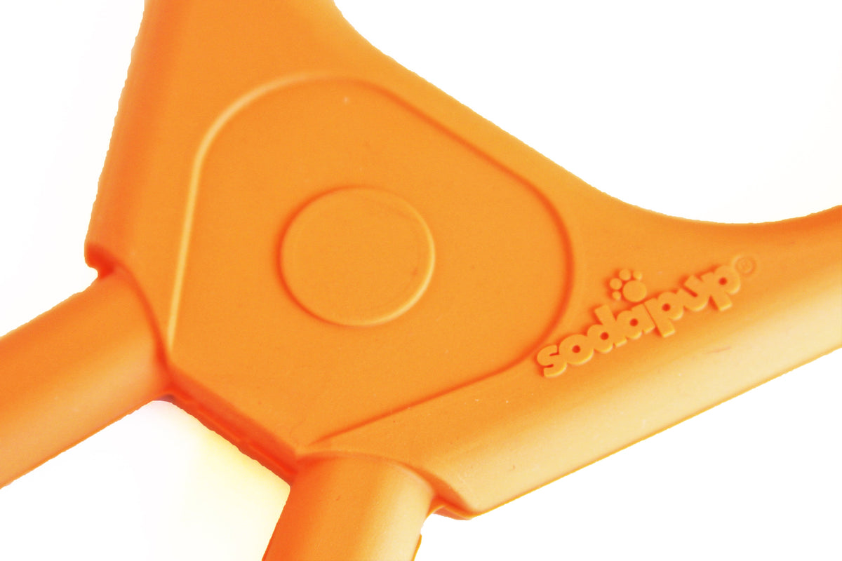 SodaPup Pop Top Rubber Tug Toy, close-up of the center tab where the two orange handles meet