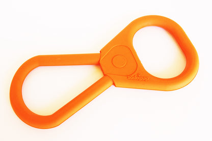 SodaPup Pop Top Rubber Tug Toy lying flat, angled view of the large and small orange handles