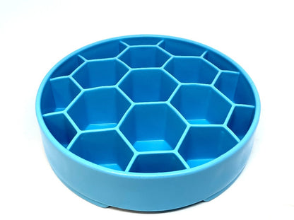 Empty blue SodaPup Honeycomb eBowl from an angle above, showing the depth of each hexagon cell