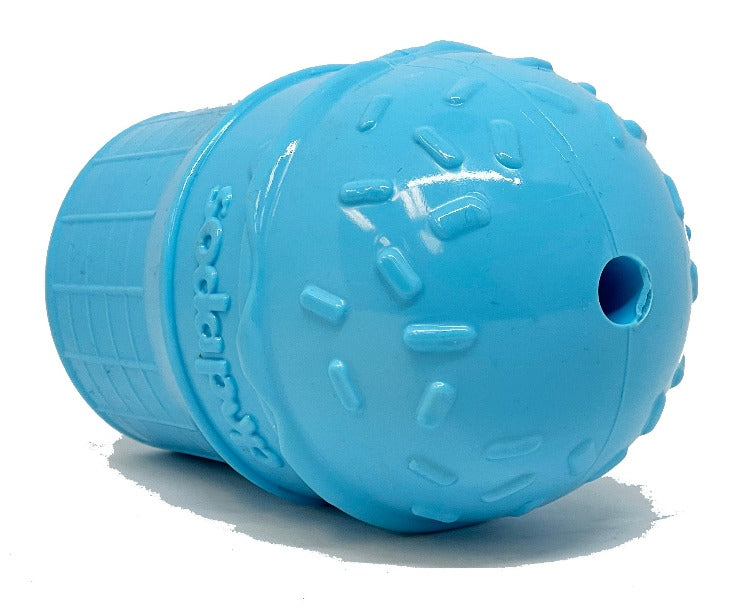 Ice Cream Cone treat dispenser lying on its side, showing the sprinkle-topped scoop and a small hole at its tip