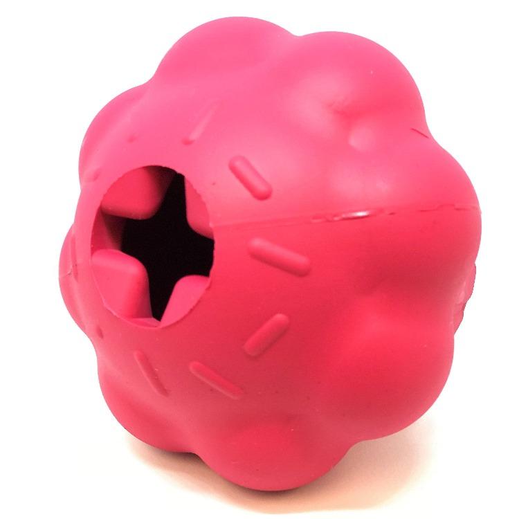 Cupcake treat dispenser from above, looking into the cross-cut fill opening with rubber teeth