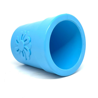 Flower Pot treat cup in blue lying on its side, looking into the open top