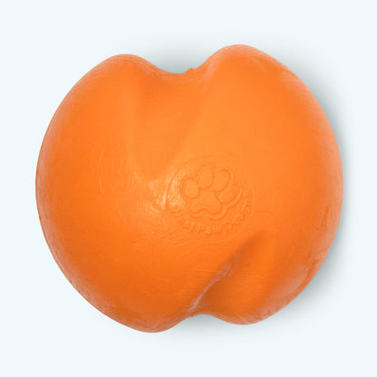 Tangerine Jive ball, straight-on close-up of the deep curved grooves and paw print