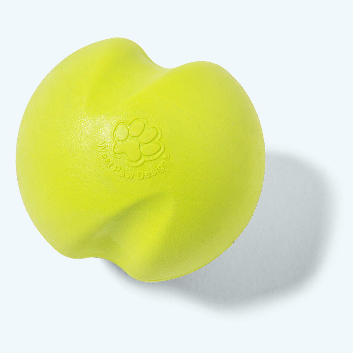Granny smith green Jive ball, close angled view of the twisting groove across the top