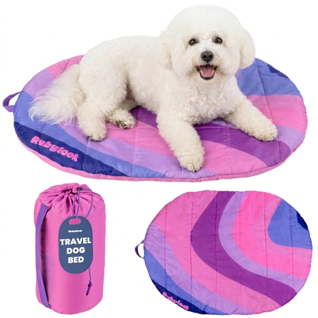 Packable travel dog bed in Pink Horizon, Small, pink and purple waves with a bichon on it and the pink carry sack