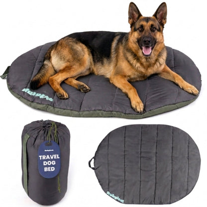 Packable travel dog bed in Midnight Forest Black, Large, with a German shepherd lying on the charcoal pad