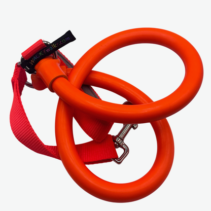 WUNDERleash stretch leash in orange, coiled, with coral nylon webbing and clip