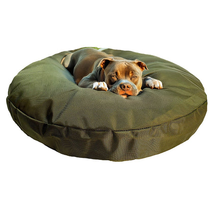 Brown pit bull type dog resting its chin on its paws on the olive Round Armor dog bed
