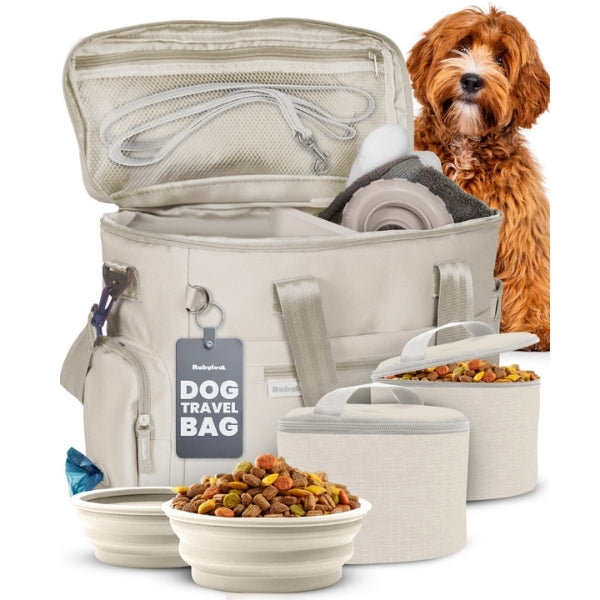 Original Doggy Bag in beige with matching collapsible bowls and food containers and a red goldendoodle behind it