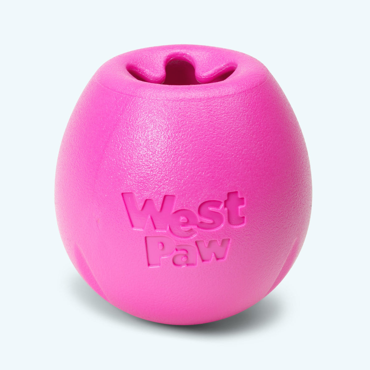 Rumbl treat dispenser in hot pink, Large size, close front view with the West Paw logo