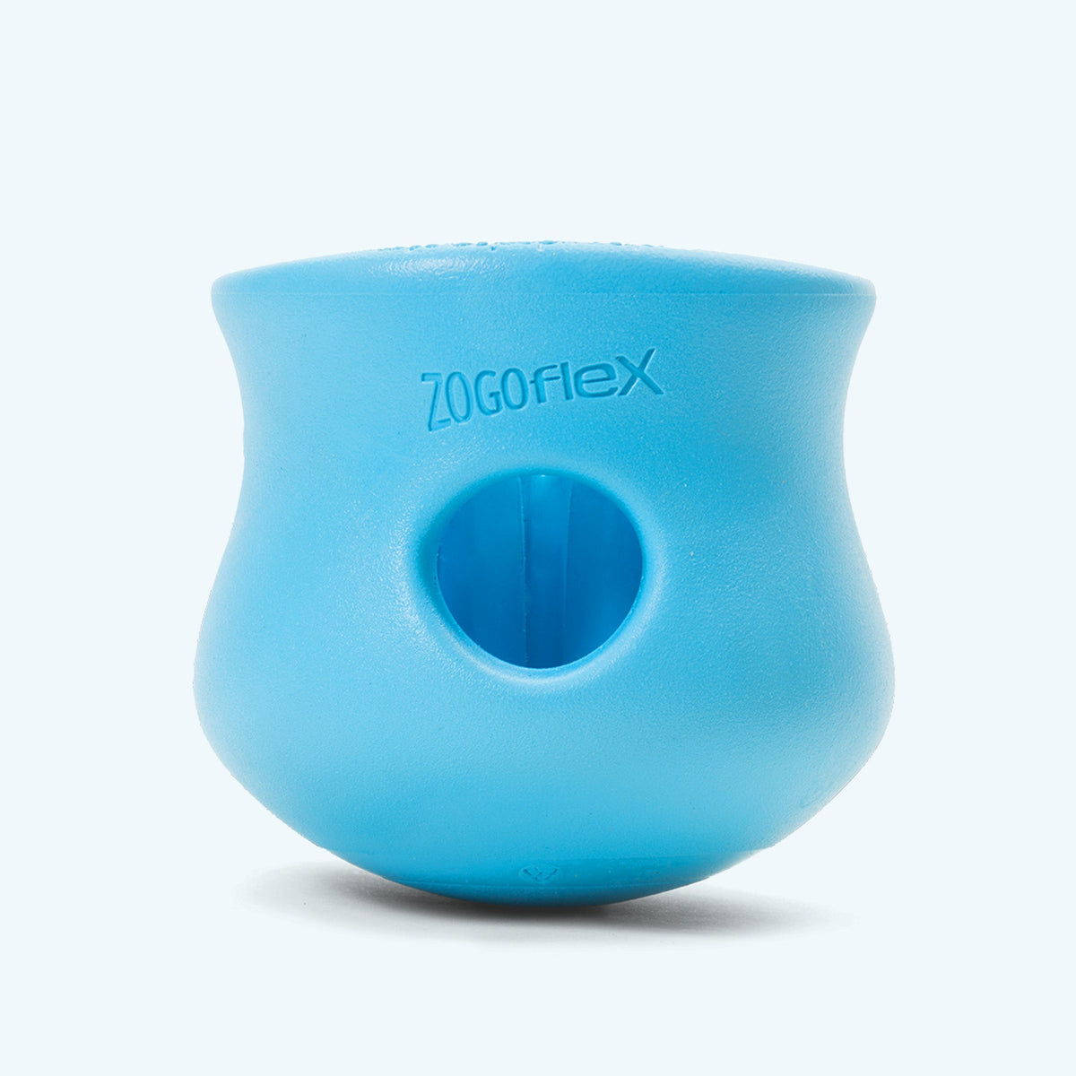 Aqua blue West Paw Toppl from the side, showing the Zogoflex label and the round side hole