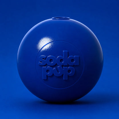 Dark blue SodaPup Squeak Ball, front view on a dark blue background with a glossy finish