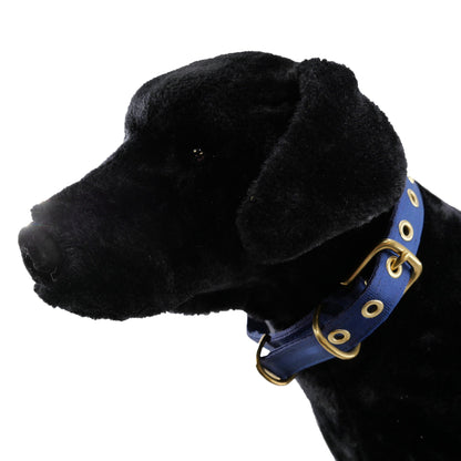 Seatbelt webbing dog collar in navy, buckled on a black plush dog model