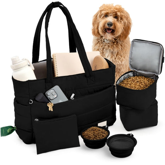 Rubyloo puffer dog travel tote in black with its two food containers, two collapsible bowls and treat bag, on white