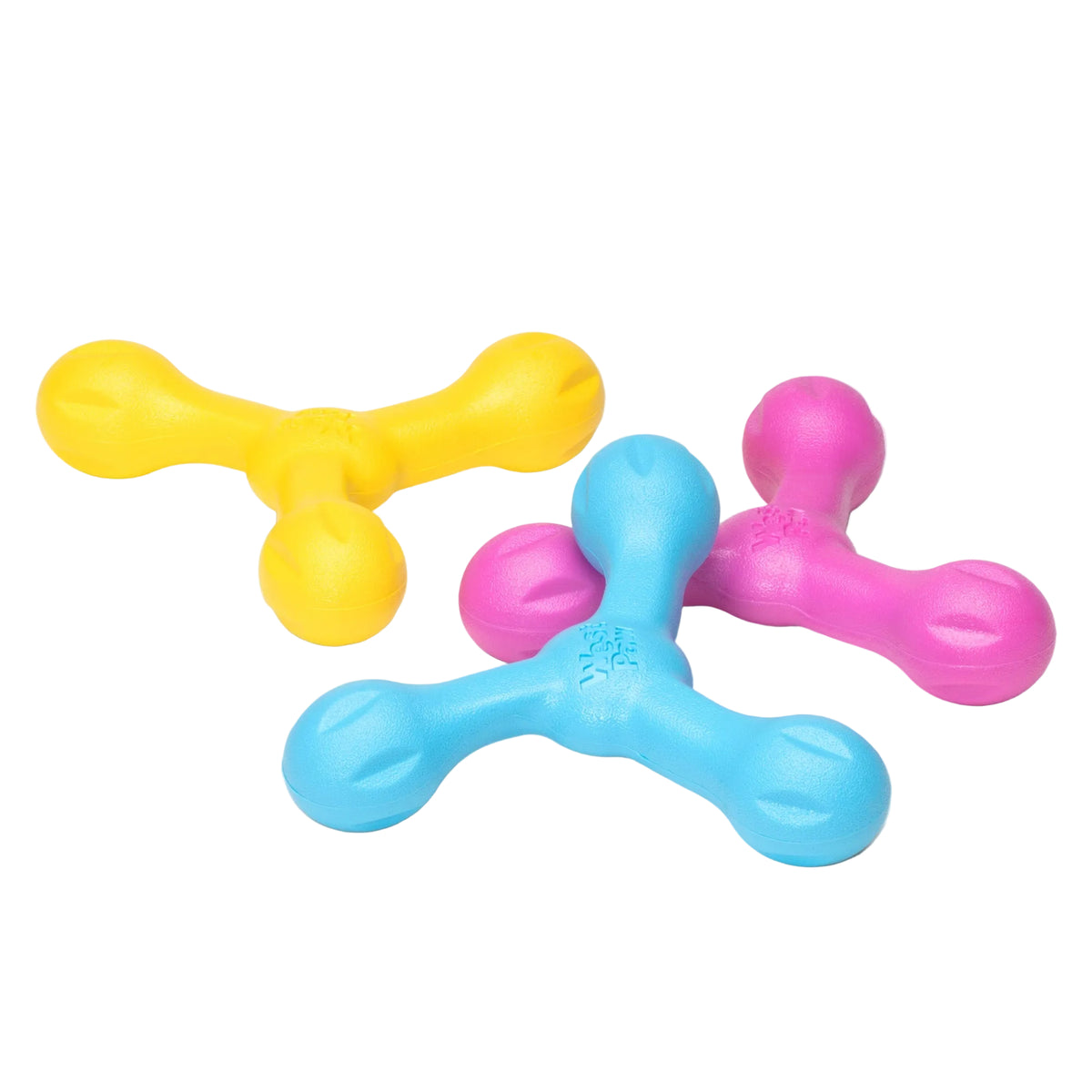 Skamp fetch toys in dandelion yellow, hot pink and aqua, three piled together
