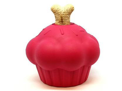 Cupcake treat dispenser standing on its flat base with a bone-shaped dog biscuit in the top opening