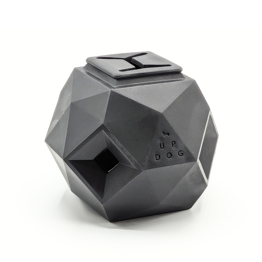Up Dog Odin Treat Puzzle Ball in slate grey, angled view of the faceted shape, top fill slot and side treat openings
